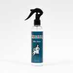 This is a picture of a bottle of Polysh Latex Shiner with a black spray nozzle attachment.