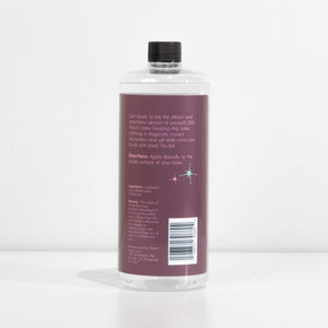 
                  
                    Clear silicone liquid in a 32 ounce bottle with details, directions, ingredients and warnings.
                  
                